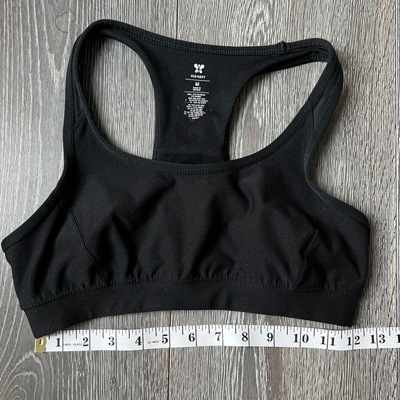 Old Navy black racer back sports bra with reflective tape. Size medium - Picture 5 of 6